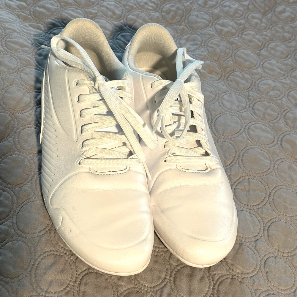Practically new pair of Puma driving sneakers.